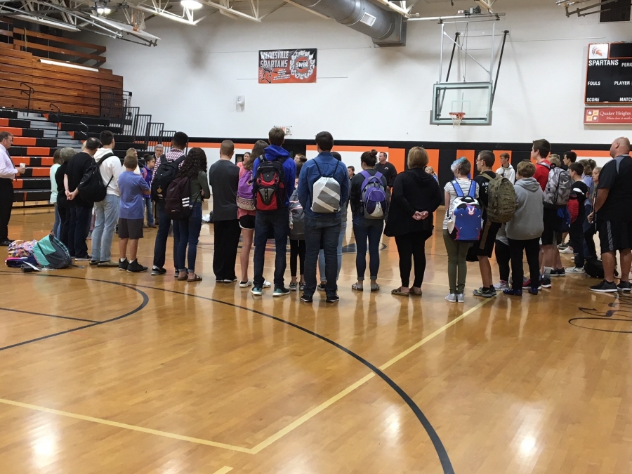 people gathered in a gym